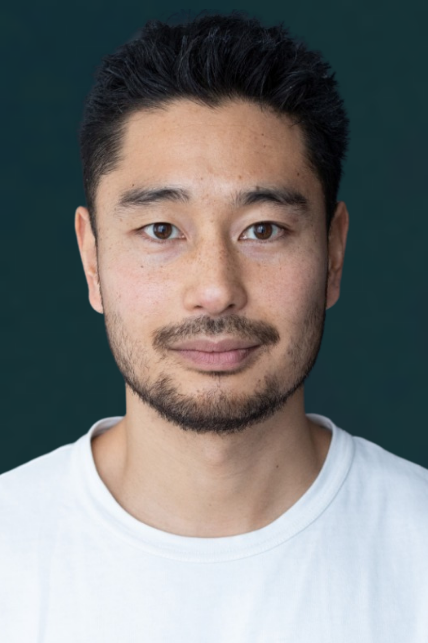 Porträtfoto von Sho Tatai I Trainer und Coach bei Com-Across